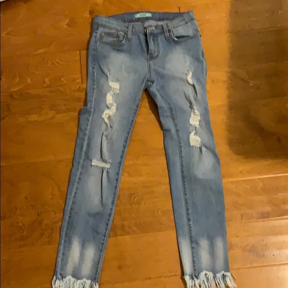 Karlie blue jeans with holes and fray